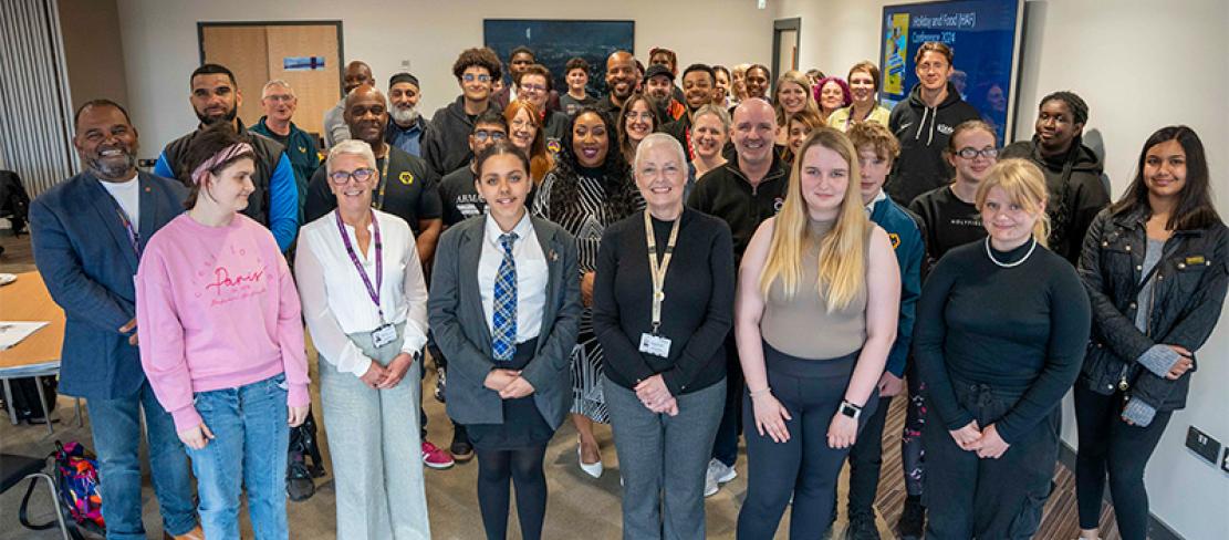 Front centre, Councillor Jacqui Coogan, Cabinet Member for Children, Young People and Education, second from left Alison Hinds, Director of Children’s Services at the City of Wolverhampton Council, along with young people and providers from the Yo! Wolves holiday activity and food programme.